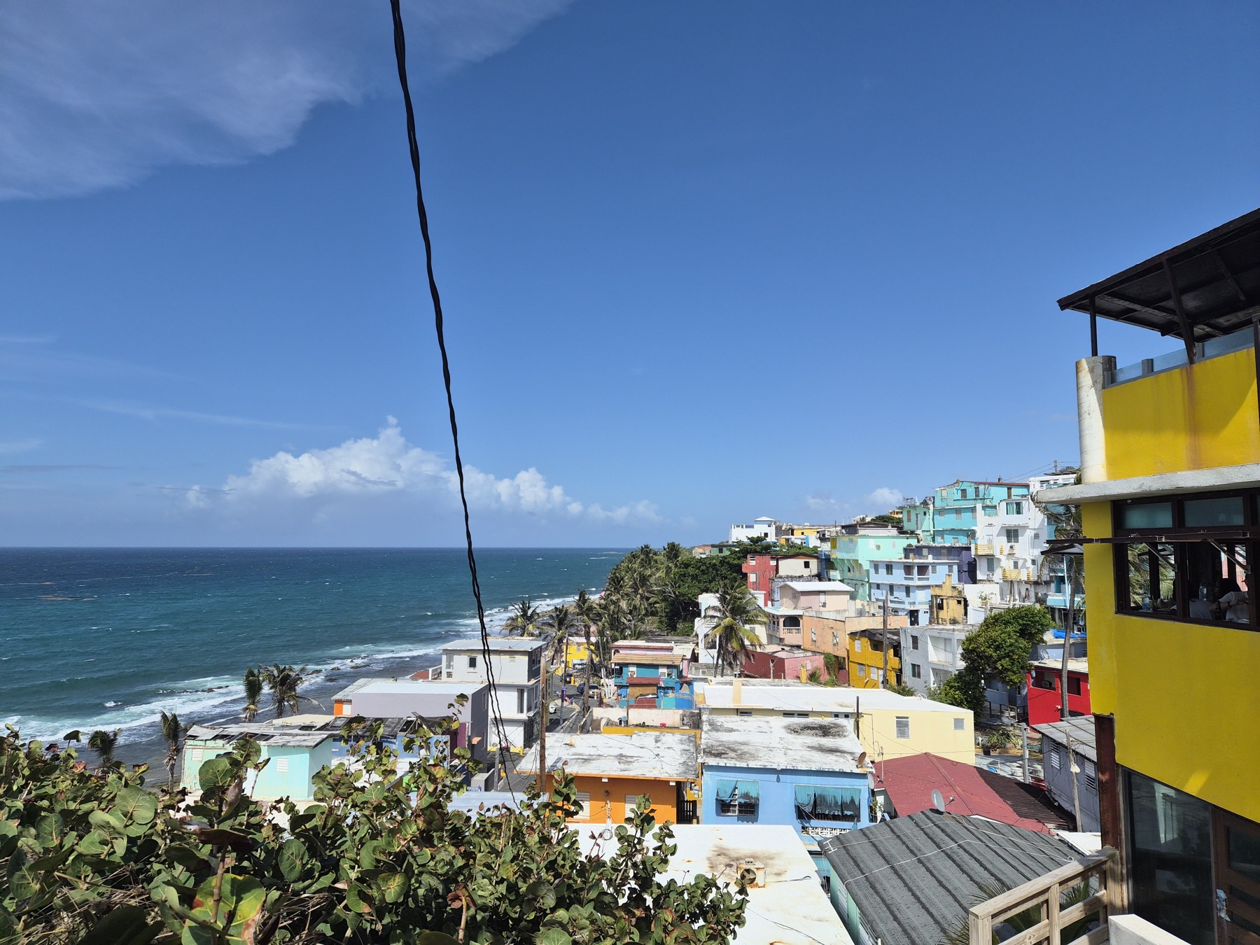 Colorful street and historic buildings near La Perla