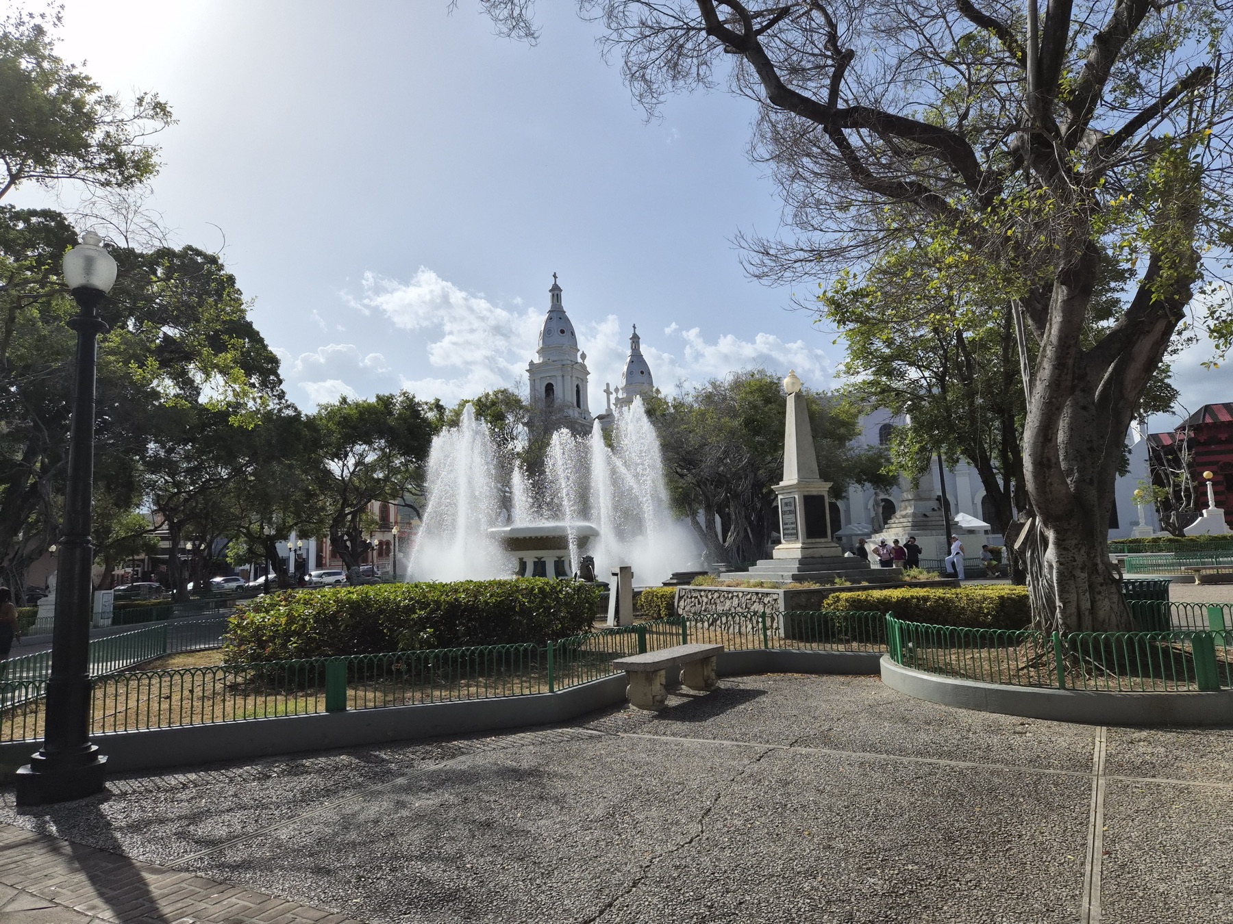Fuente de los Leones and the cathedral towers in Plaza Las Delicias